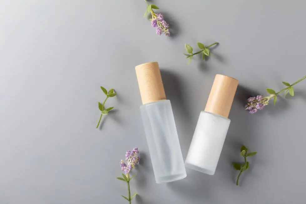 top view skincare bottles surface with lavender flower jpg