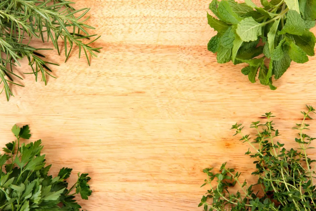 fresh herbs on chopping board jpg