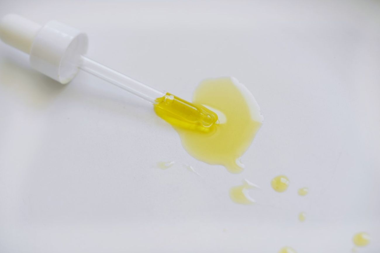 close up of the pipette with facial oil cosmetic b 2022 11 15 02 38 20 utc