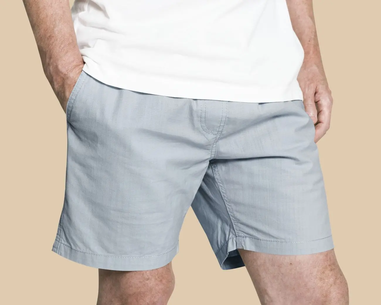 man wearing blue shorts close up jpg